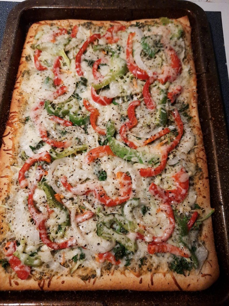 Recipe: Vegetarian Pizza with Basil Paste, Mixed Greens, Bell Peppers, Onions, and more