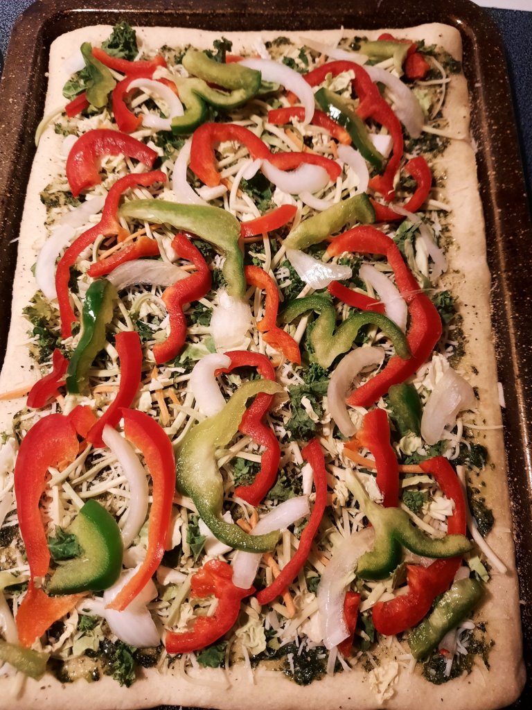 Recipe: Vegetarian Pizza with Basil Paste, Mixed Greens, Bell Peppers, Onions, and more