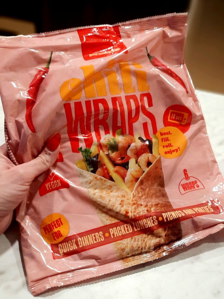 Prozis chili wraps high protein and fiber, healthy vegan foods, Kae Audhild fitness model and alternative lifestyle blogger, nails using una gella short almond tips and beetles autumn orange glitter gel polish, fall 2023 manicure 