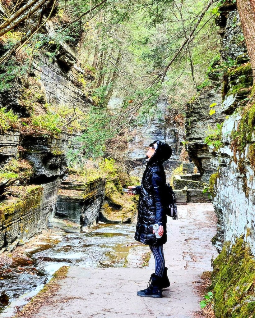 Kae Audhild exploring Robert H Treman State Park in Ithaca, New York in November 2023 - FLX Finger Lakes travel outdoor attractions wine country - neurodivergent friendly activities - hiking, outdoor fitness - upstate NY autumn - alternative lifestyle blogger and fitness model