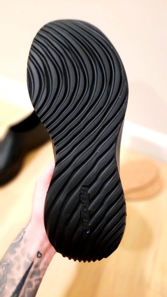 Sole tread of Prozis black Apex RVF sneakers, best recovery shoes for athletes, foot models feet, fitness sponsors, how do bloggers influencers get gifted free luxury stuff