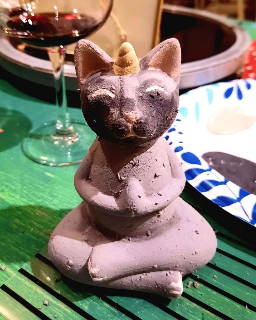 Kae Audhild paints Zen caticorn - wine and ceramics glazing at uncorked creations Binghamton ny