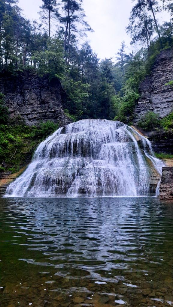Sunrise at the lower falls swimming area at Robert H Treman State Park in Ithaca, NY