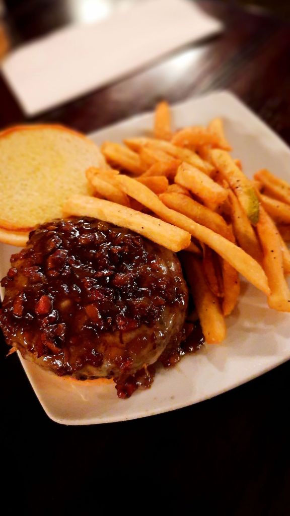 The Irishman (burger) - grilled beef burger topped w/ beer bacon jam and sharp cheddar cheese on a brioche bun - w/ side of fries 