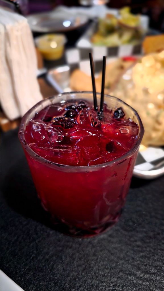 Blueberry Lemon Spritz - tequila, muddled blueberries and lemon, triple sec, club soda. Cocktails at South City Pub & Grill in Binghamton, New York