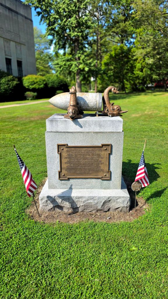10 inch shell and bronze port cover recovered from the wreck of The Battleship Maine 