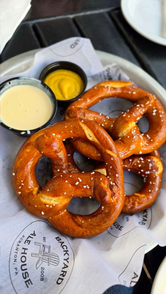 Bavarian Pretzels - toasted pretzels, house cheese sauce, bistro mustard backyard Ale House Scranton Pennsylvania