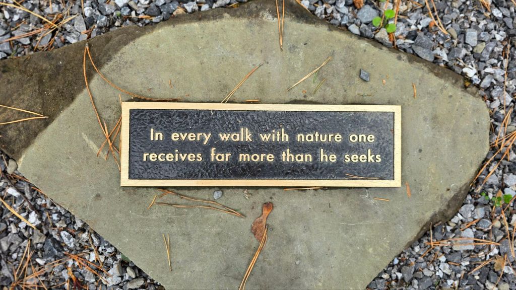 Plaque at ANT Autism Nature Trail at Letchworth State Park - "In every walk with nature one receives far more than he seeks" 