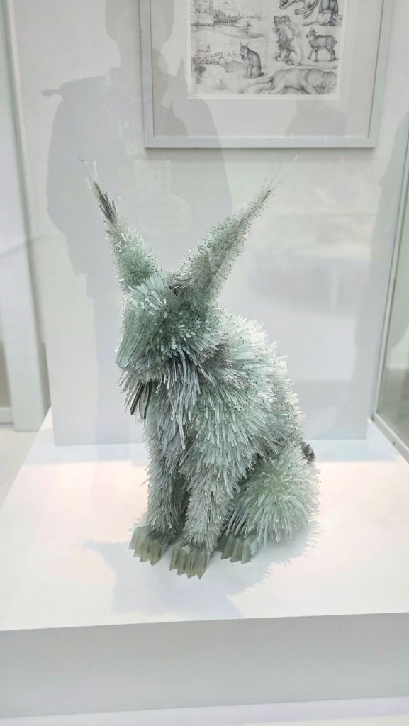 Green lynx glass art at Corning Museum of Glass in Corning NY - best finger Lakes destinations