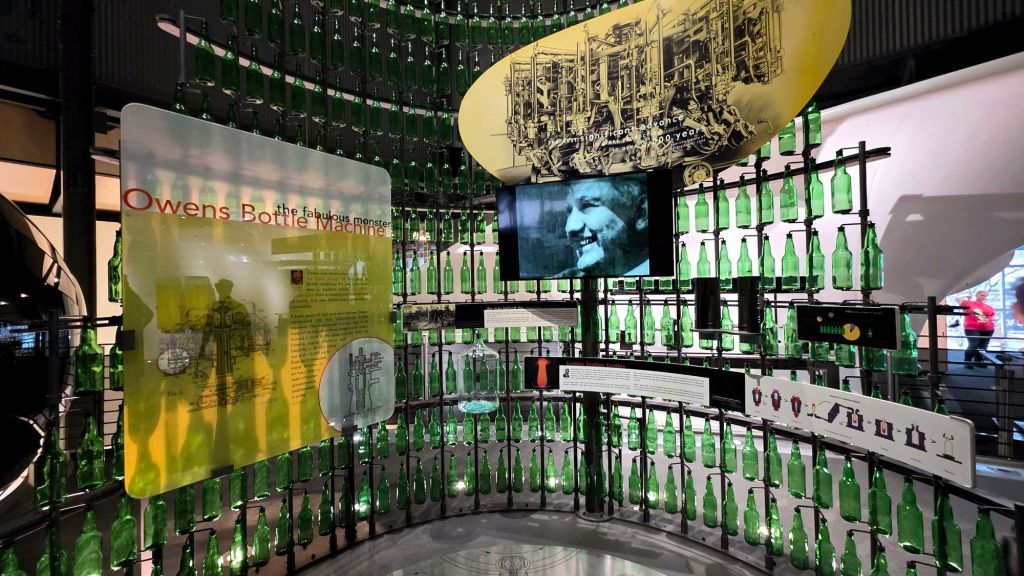 Owens Bottle Machine process how it works at Corning Museum of Glass in Corning NY