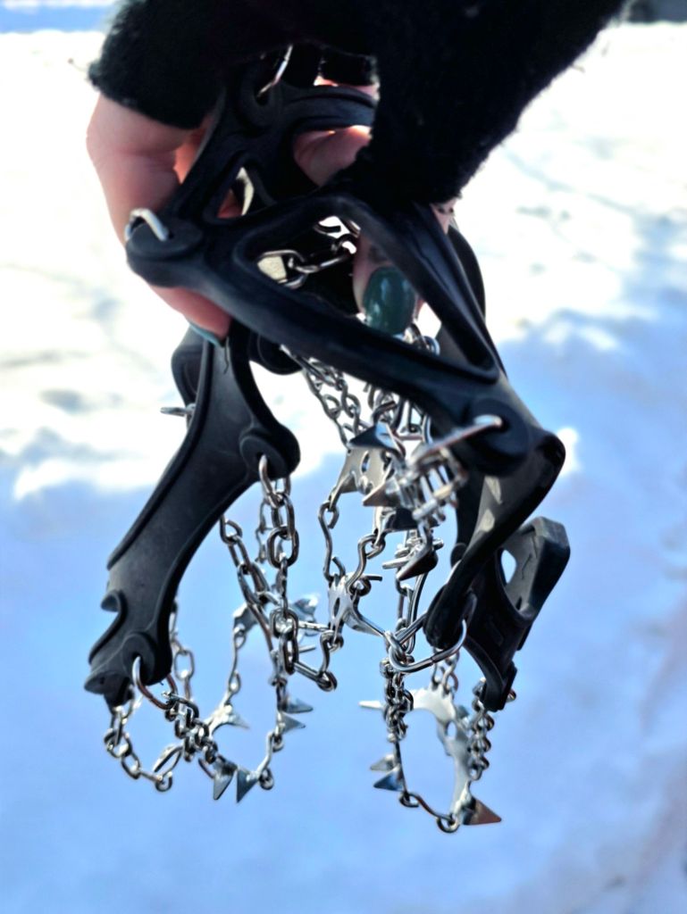 Microspikes traction cleats for winter hiking on icy trails in Upstate New York, essential gear for safe winter hikes at Clark Reservation State Park.